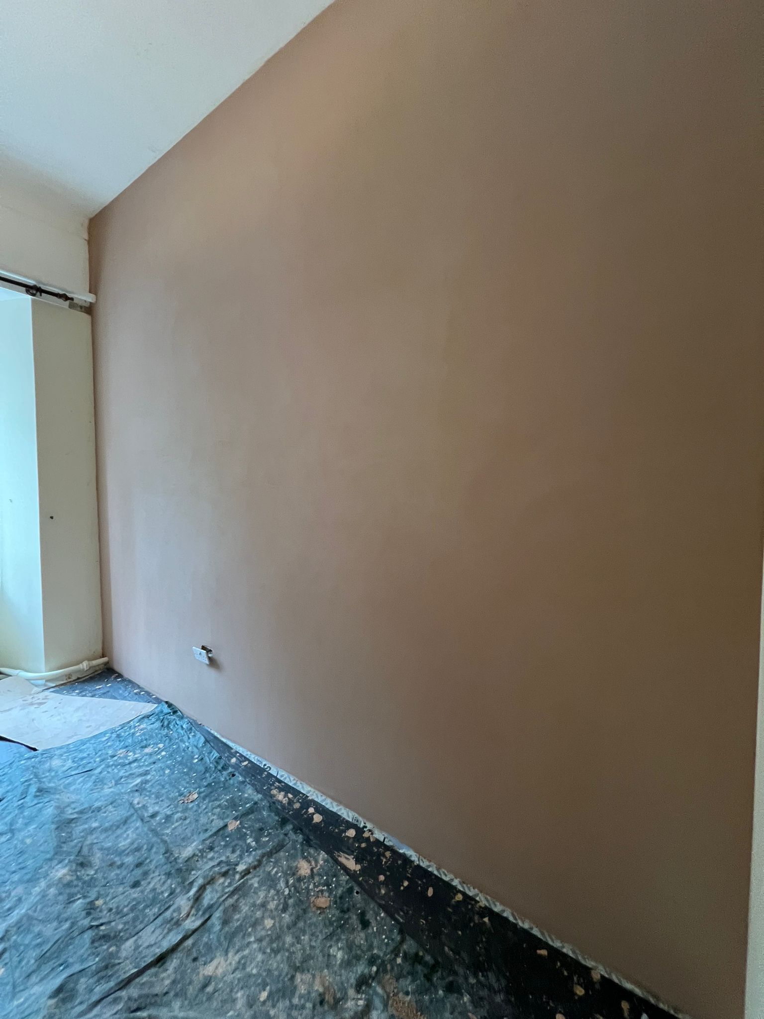 Smooth fresh plaster skim finish on interior wall
