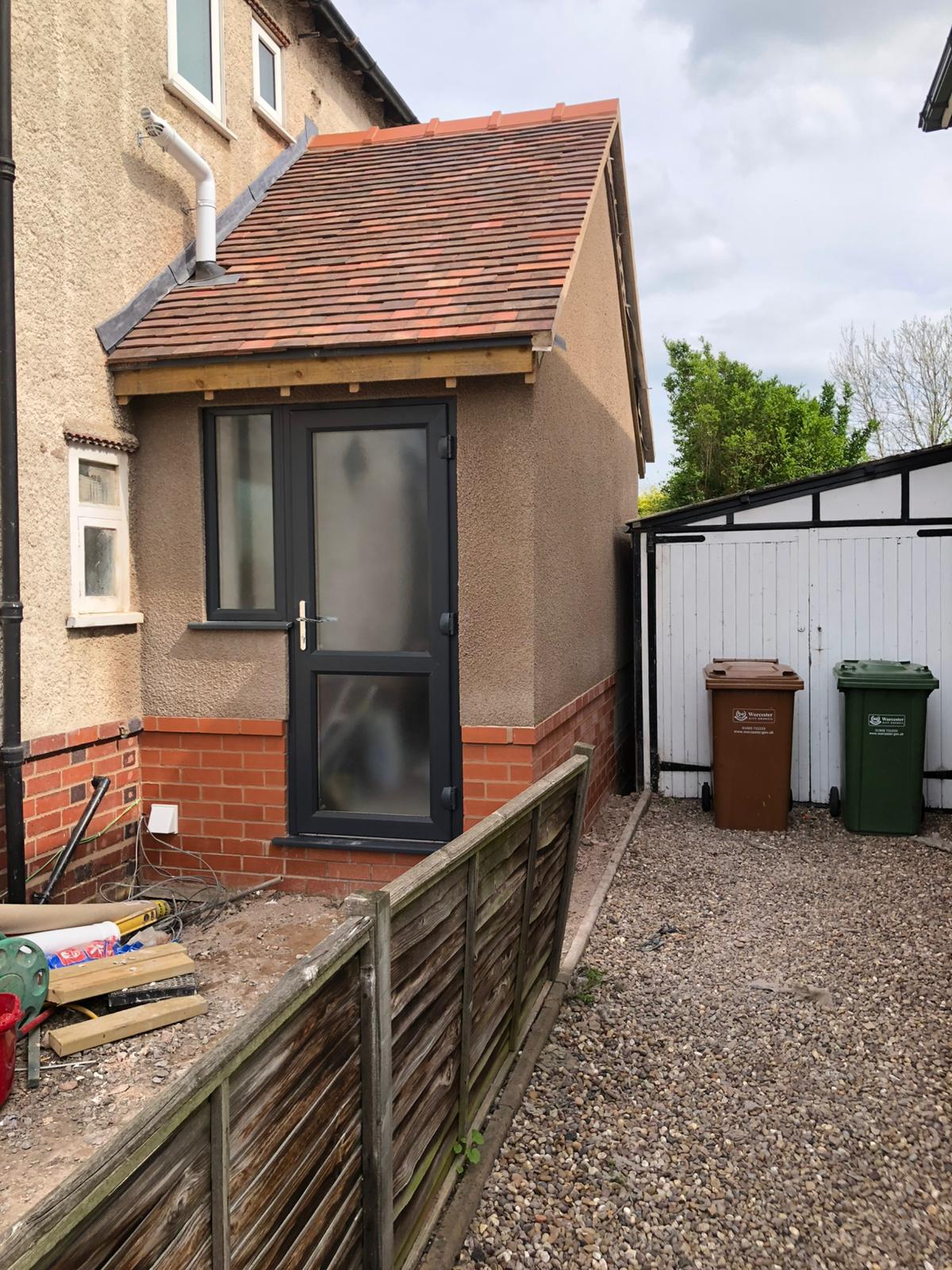Rendered house extension with new render finish — Malvern and Worcester Plastering