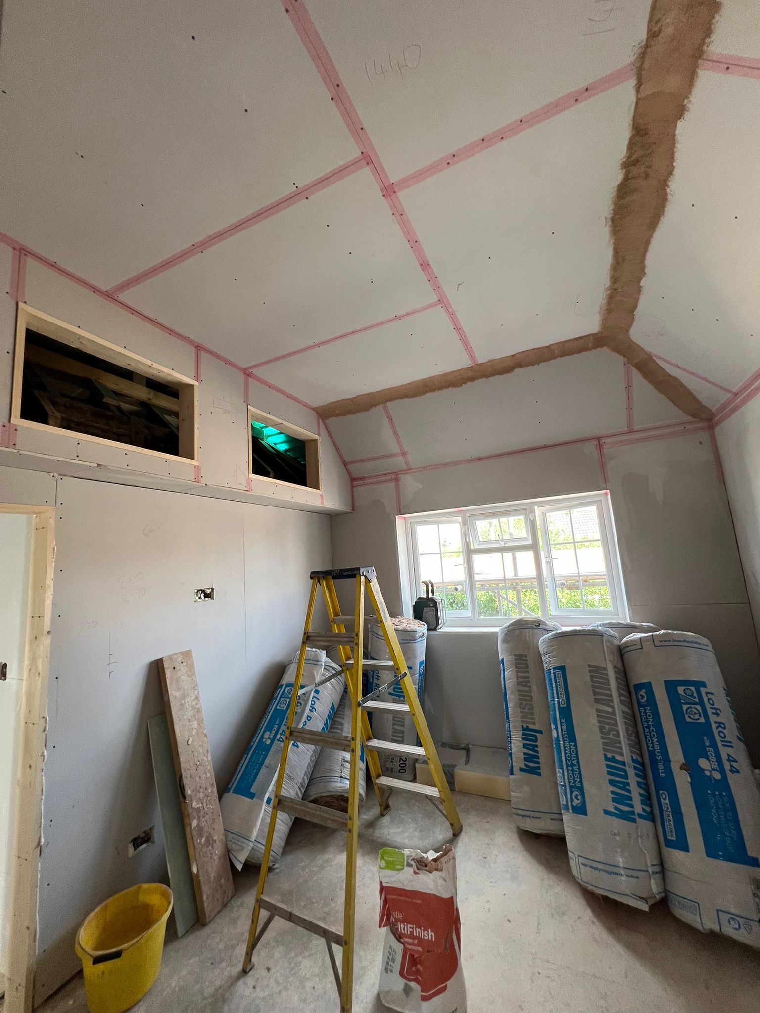Plasterboarding loft conversion with Knauf insulation