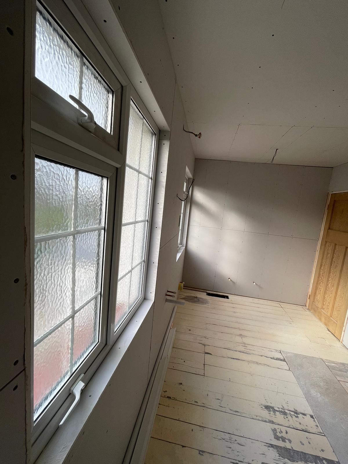Hallway and landing area plasterboarded ready for skim