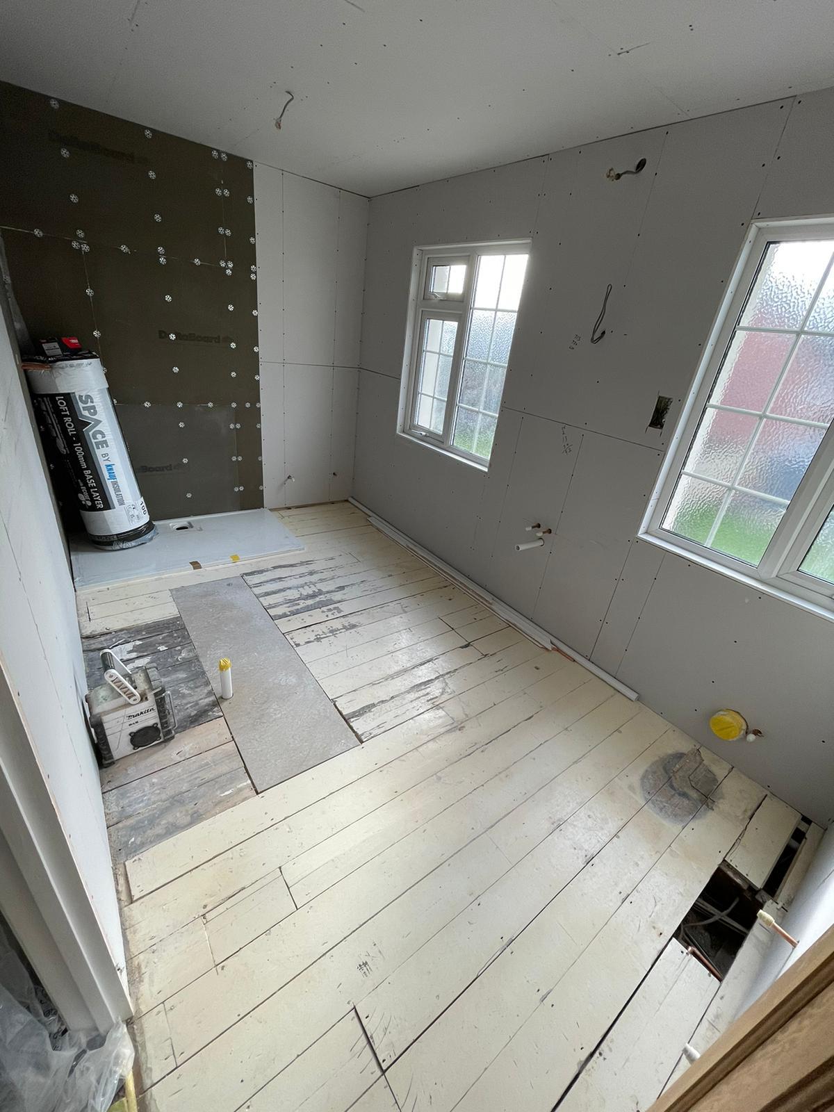 Bathroom boarding with Wedi board shower area and plasterboard walls