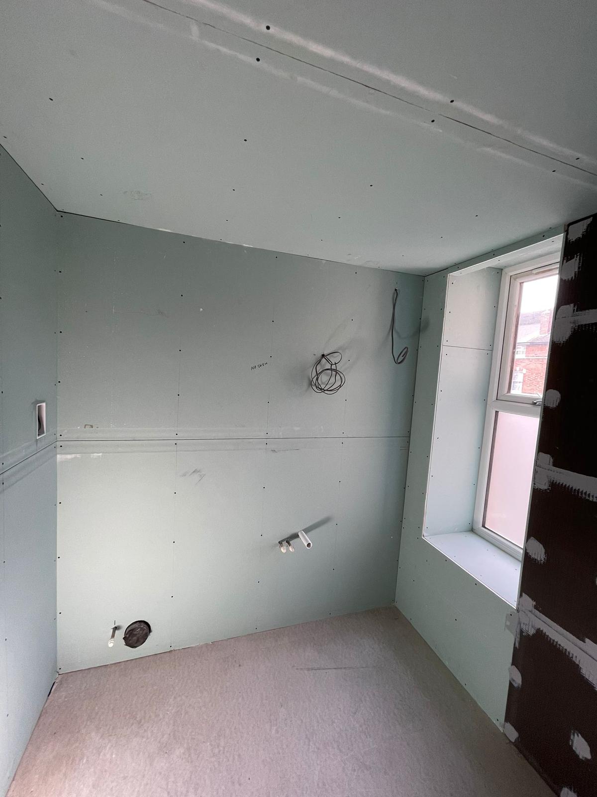 Bathroom boarded with moisture-resistant board and Wedi panel